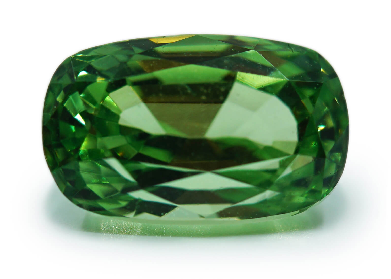 Slim deep green cushion cut tsavorite