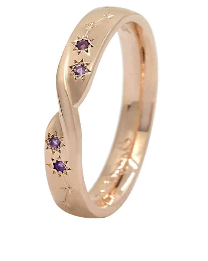 twist style gold and amethyst eternity ring