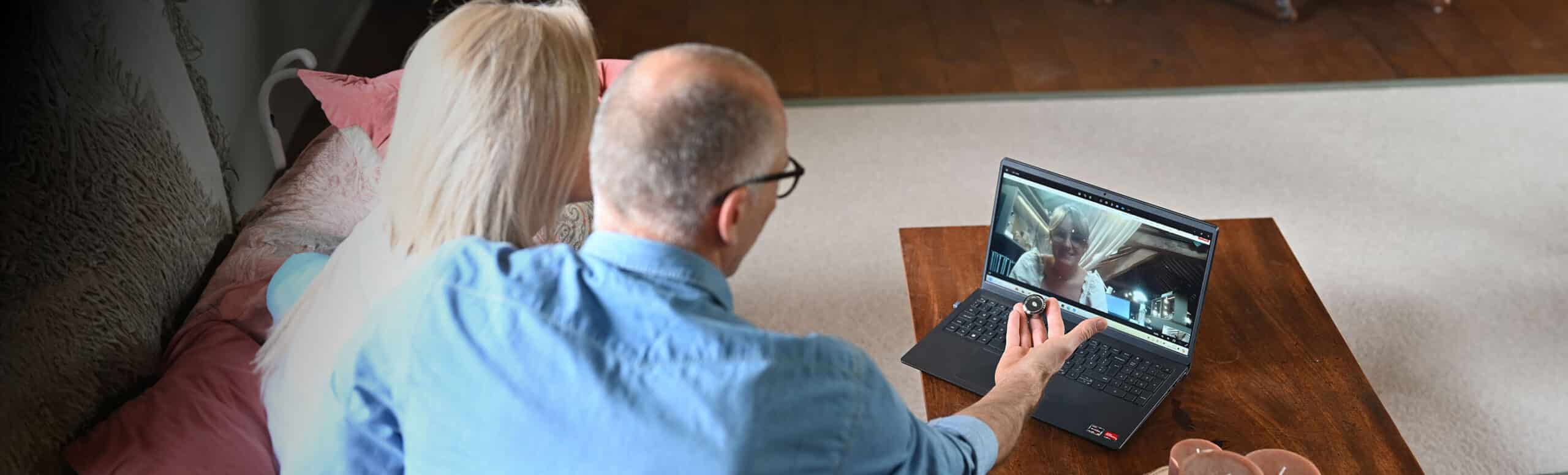 couple with diamond and computer screen